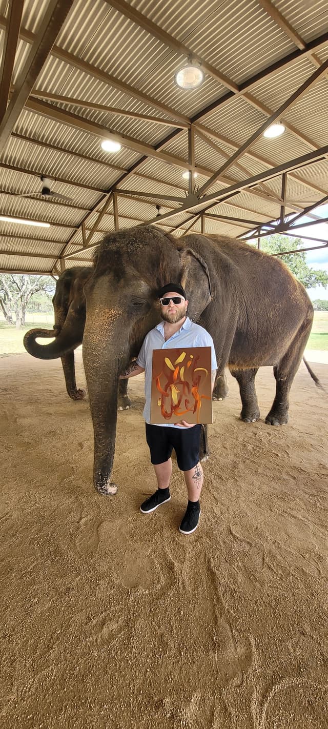 Wil Paschall next to elephant
