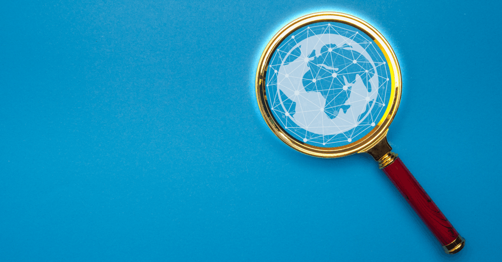 Magnifying glass with picture of globe