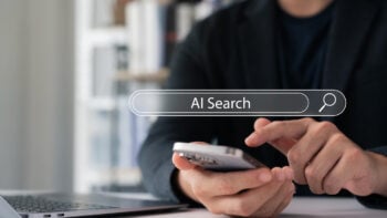 Man using smartphone with AI search bar overlay